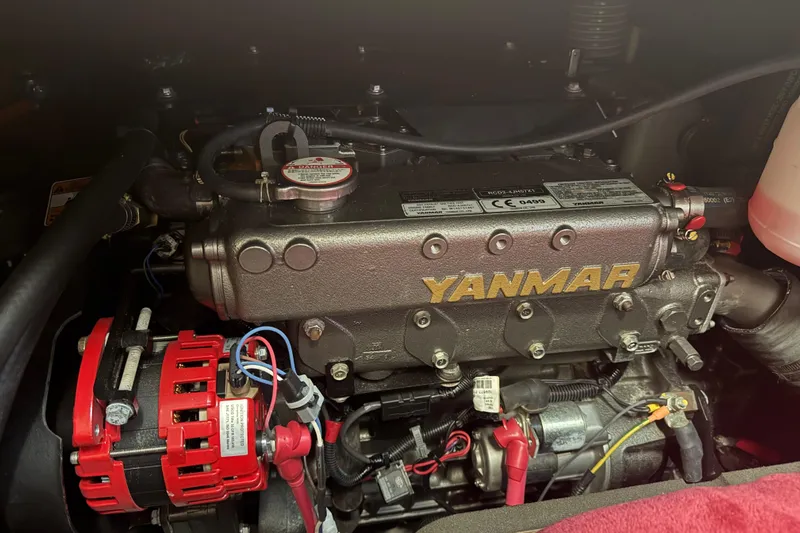 Deli Mavi Yacht Photos Pics Yanmar engine in a 2019 Beneteau Oceanis 41.1 sailboat, showcasing detailed components.