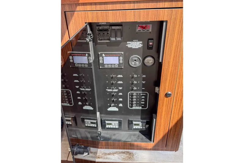  Yacht Photos Pics Electrical control panel of 2024 Pursuit DC 365 Dual Console boat.