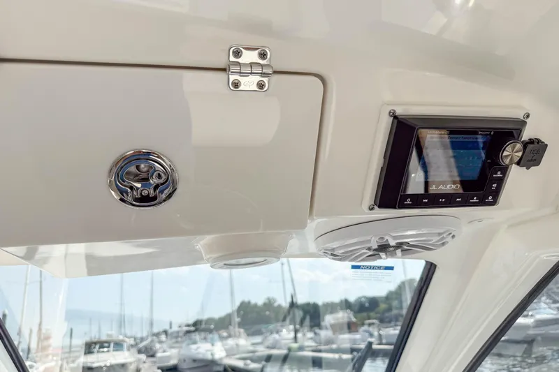  Yacht Photos Pics 2024 Pursuit DC 365 Dual Console interior with JL Audio system and speaker.