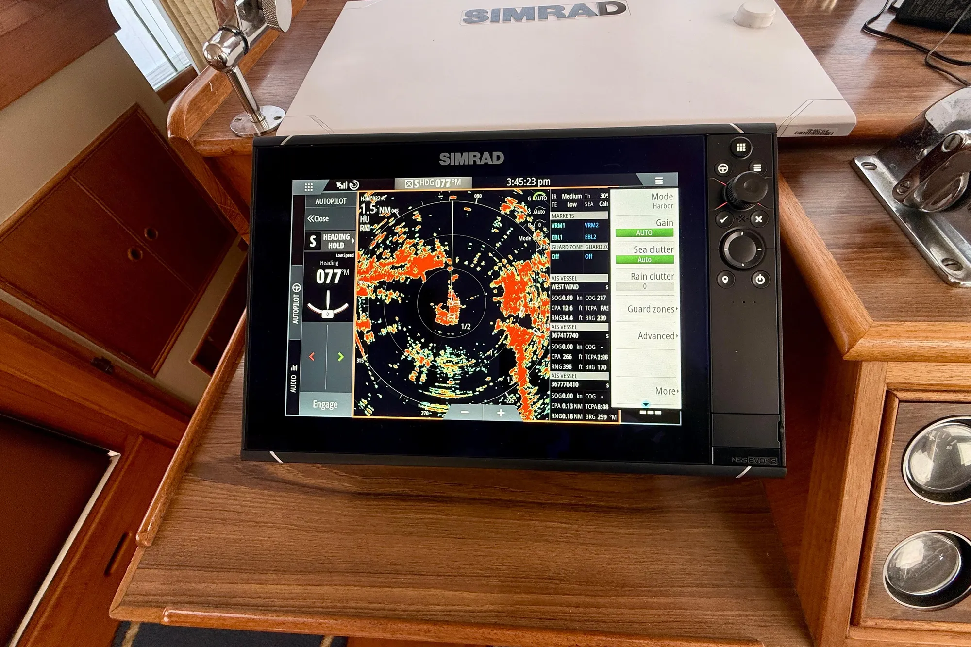 Simrad navigation system on 1982 Grand Banks Classic boat dashboard.