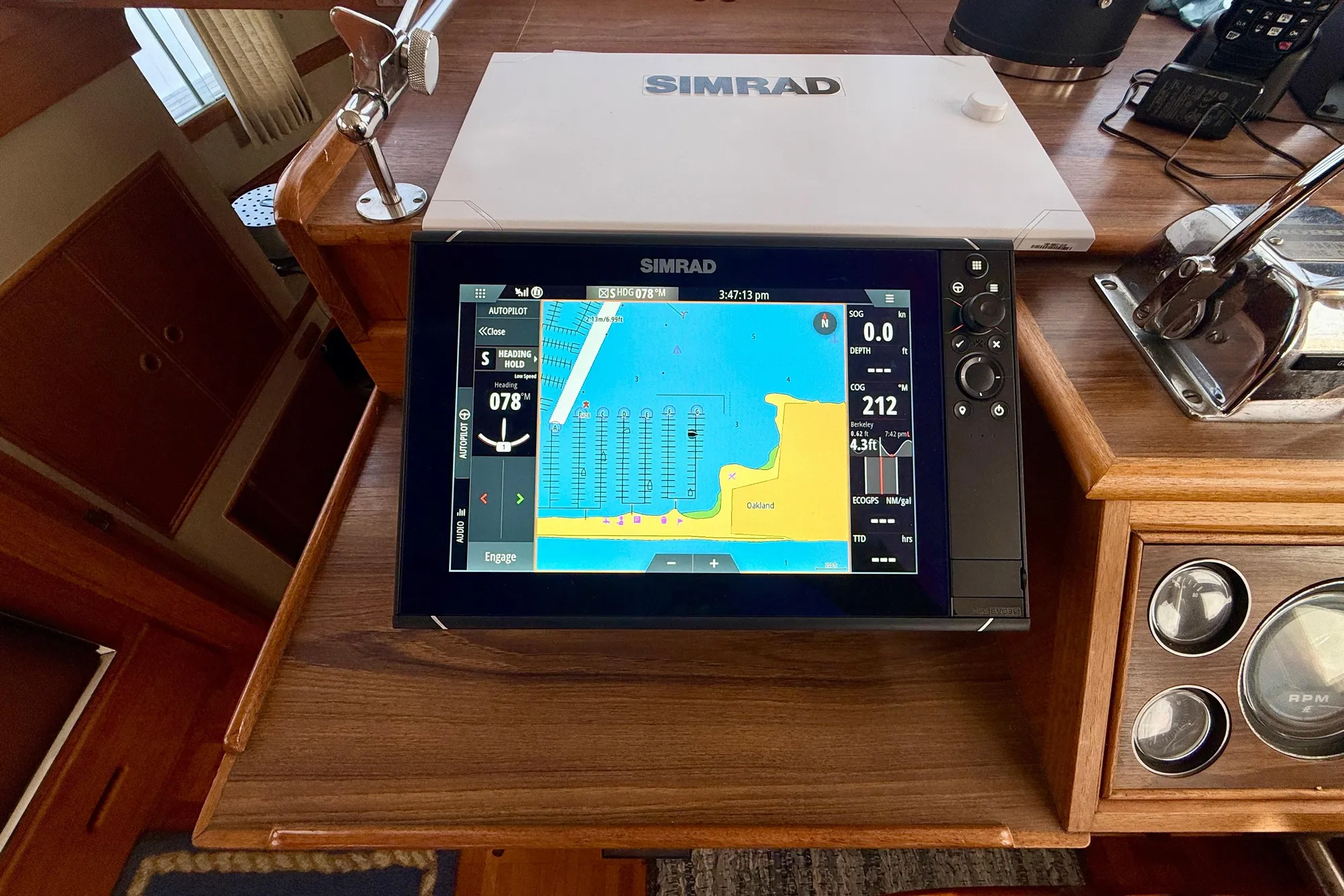 Simrad navigation system on 1982 Grand Banks Classic yacht dashboard.