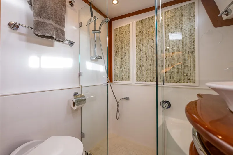 Sea Song Yacht Photos Pics Luxurious bathroom in 2019 Sabre 48 Salon Express yacht with modern shower and elegant design.