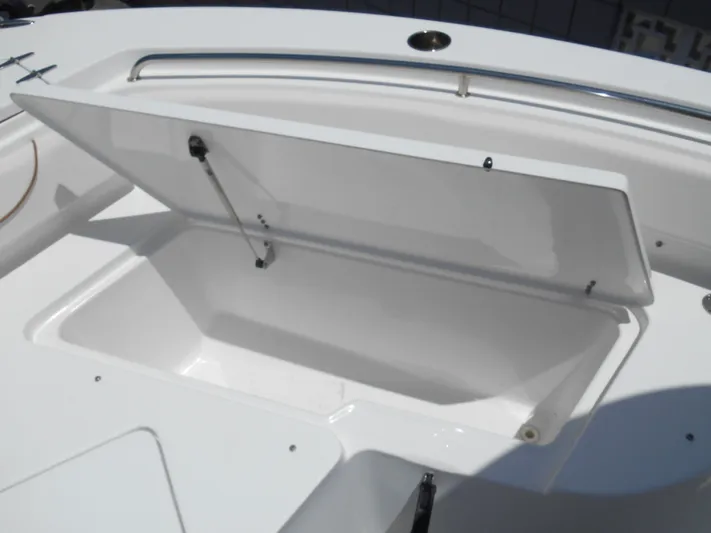  Yacht Photos Pics Open storage compartment on 2019 Sea Hunt Ultra 235 SE boat.