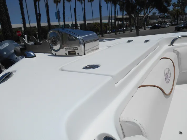  Yacht Photos Pics 2019 Sea Hunt Ultra 235 SE boat deck with seating and equipment.