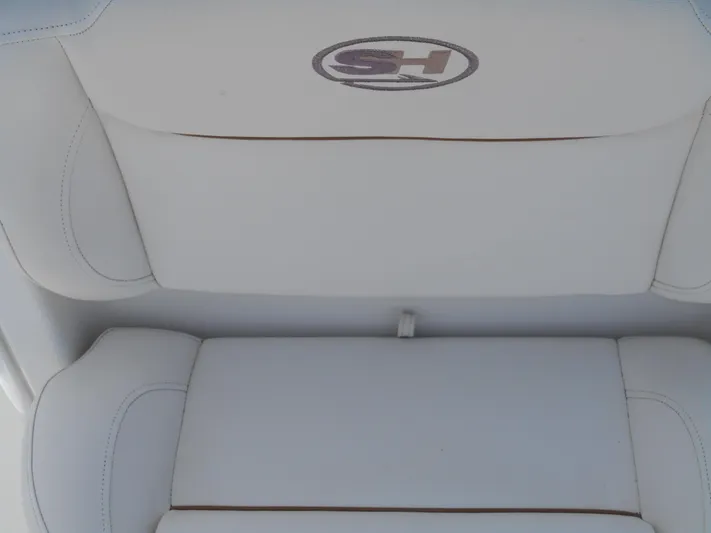  Yacht Photos Pics 2019 Sea Hunt Ultra 235 SE boat seat with logo, white upholstery.