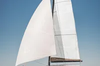 2025 Nautitech 44 Open catamaran sailing on open water under clear blue sky.