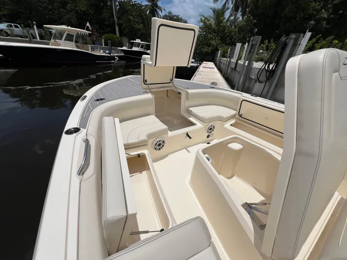  Yacht Photos Pics 2025 Scout 281 XSS boat interior with open storage compartments and seating.