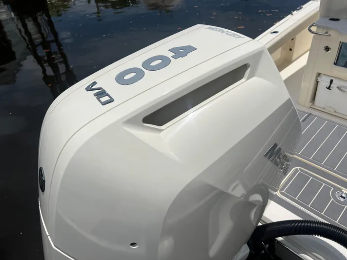  Yacht Photos Pics 2025 Scout 281 XSS boat with Mercury V10 400 outboard engine on water.