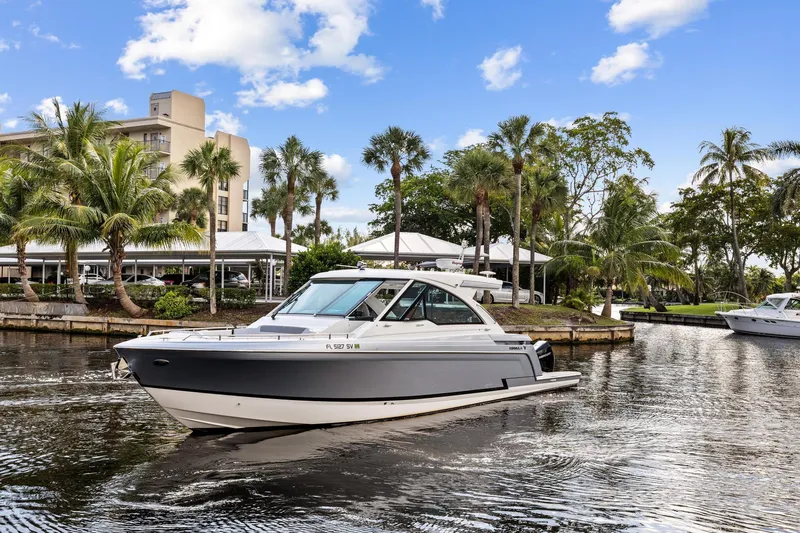 Happy 2 Gether Yacht Photos Pics 2021 Formula 380 Super Sport Crossover OB on a tropical waterway.