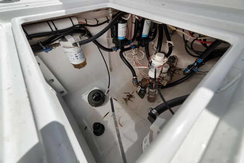  Yacht Photos Pics 2004 Contender 25 Tournament boat interior showing wiring and components.