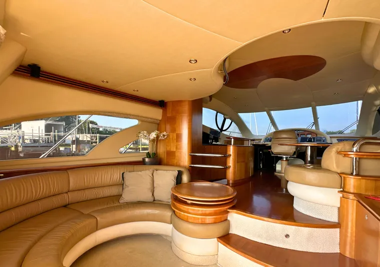 Andiamo Yacht Photos Pics Luxurious interior of a 2010 Azimut 55E yacht with elegant seating and modern design.