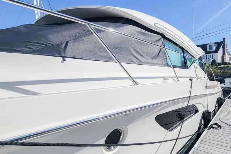 Courageous Yacht Photos Pics 2020 Tiara Yachts C53 Coupe docked, showcasing sleek design and modern features.