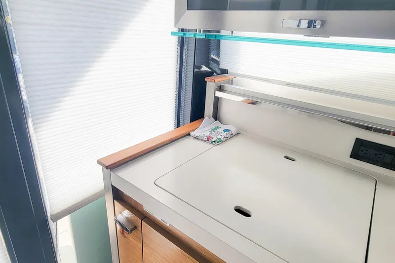 Courageous Yacht Photos Pics Interior of 2020 Tiara Yachts C53 Coupe, featuring sleek cabinetry and modern design elements.