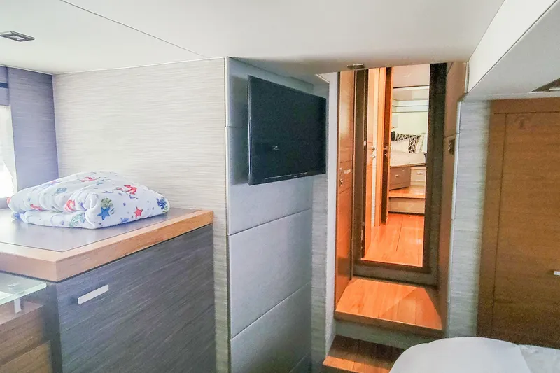 Courageous Yacht Photos Pics Interior of 2020 Tiara Yachts C53 Coupe, featuring modern design and cozy amenities.