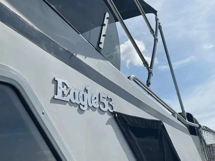 Sojourner Yacht Photos Pics Transpacific Marine EAGLE 53 yacht, 2002 model, with clear sky background.