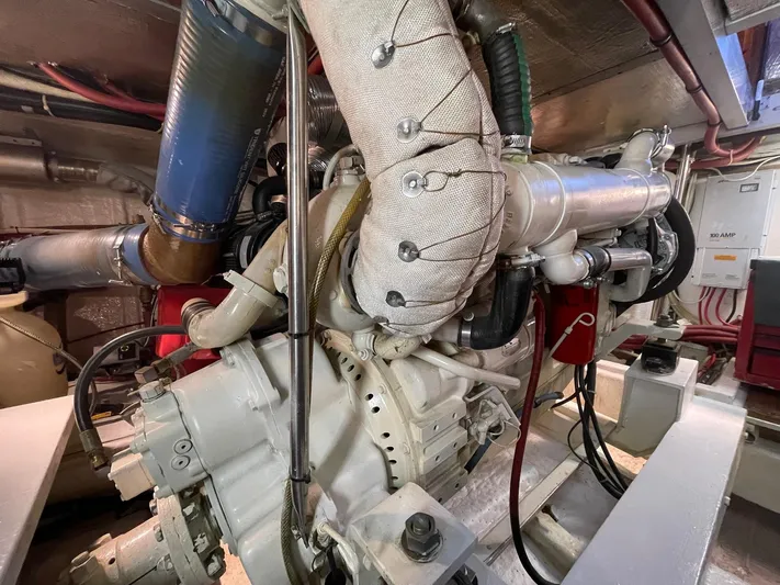 Sojourner Yacht Photos Pics Engine room of 2002 Transpacific Marine EAGLE 53 yacht, showcasing complex machinery and components.