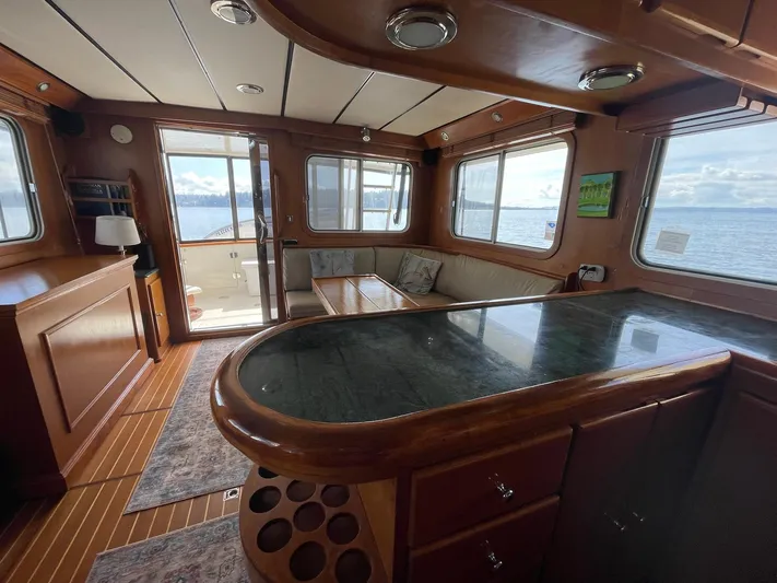 Sojourner Yacht Photos Pics Luxurious interior of 2002 Transpacific Marine EAGLE 53 yacht with panoramic windows.