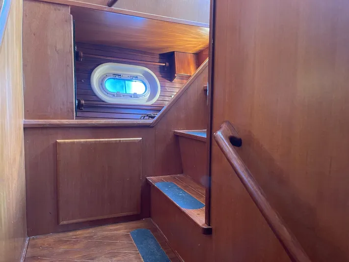 Sojourner Yacht Photos Pics Wooden interior stairs on a 2002 Transpacific Marine EAGLE 53 yacht.