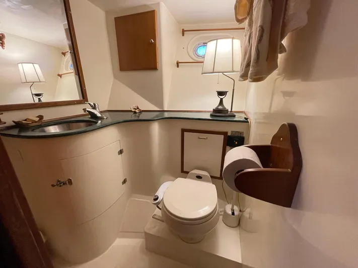 Sojourner Yacht Photos Pics Bathroom interior of 2002 Transpacific Marine EAGLE 53 yacht, featuring sink and toilet.