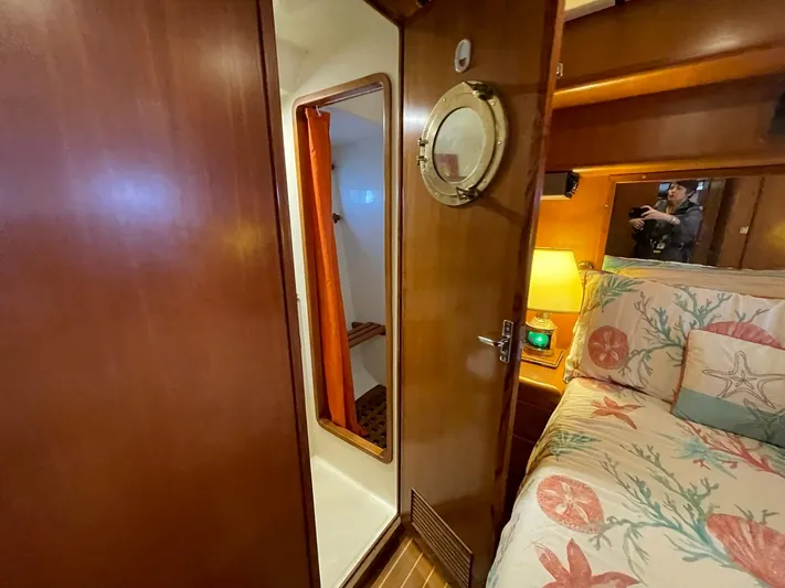 Sojourner Yacht Photos Pics Cozy cabin interior of 2002 Transpacific Marine EAGLE 53 yacht with nautical decor.