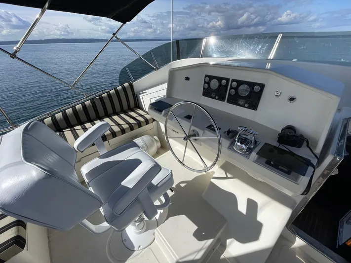 Sojourner Yacht Photos Pics Helm of 2002 Transpacific Marine EAGLE 53 yacht with steering wheel and controls.