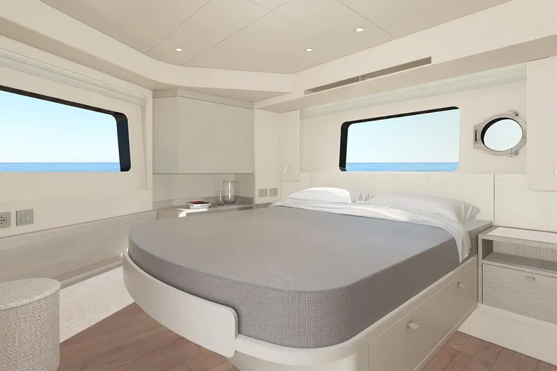  Yacht Photos Pics Luxurious bedroom interior of 2026 Absolute NAVETTA 50 yacht with ocean view windows.