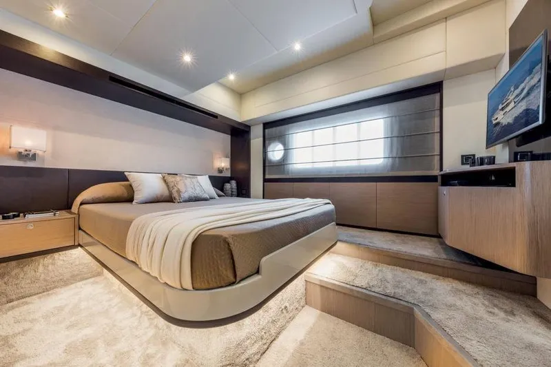  Yacht Photos Pics Luxurious bedroom interior of 2026 Absolute NAVETTA 50 yacht with modern design and cozy ambiance.