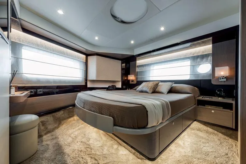  Yacht Photos Pics Luxurious bedroom interior of 2026 Absolute NAVETTA 50 yacht, featuring modern design and ambient lighting.