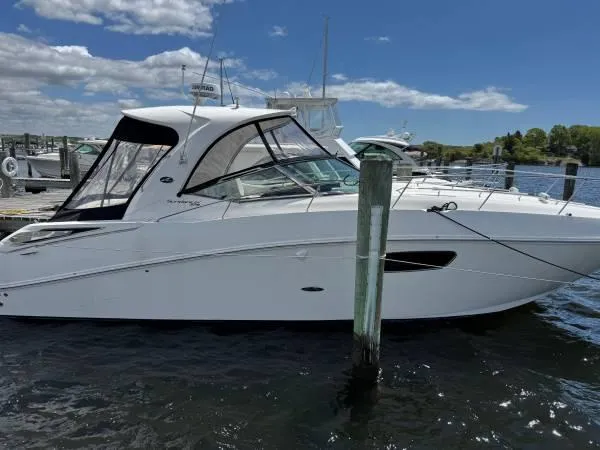  Yacht Photos Pics 2010 Sea Ray 370 Sundancer yacht docked on a sunny day.