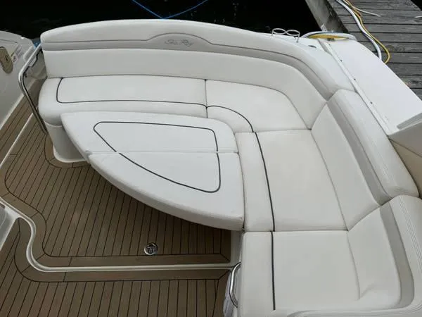  Yacht Photos Pics Luxurious seating on 2010 Sea Ray 370 Sundancer boat with elegant white upholstery.