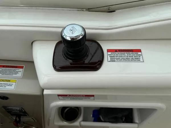  Yacht Photos Pics Control panel of 2010 Sea Ray 370 Sundancer boat with warning labels.