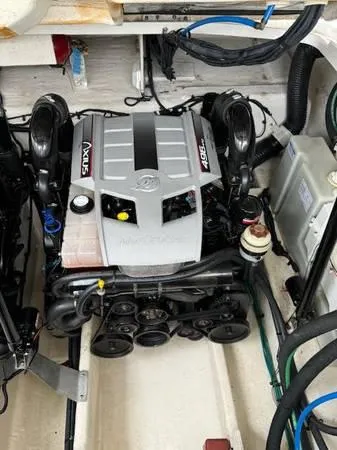  Yacht Photos Pics Engine compartment of a 2010 Sea Ray 370 Sundancer boat, featuring a powerful engine setup.