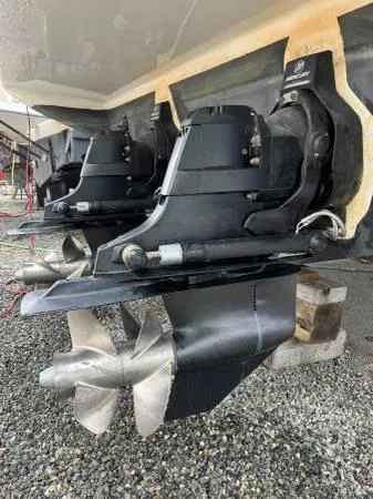  Yacht Photos Pics 2010 Sea Ray 370 Sundancer boat propellers on gravel surface.