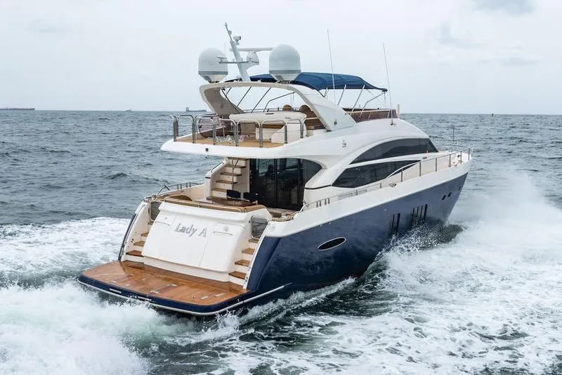  Yacht Photos Pics 2012 Princess Flybridge 72 Motor Yacht cruising on open sea.