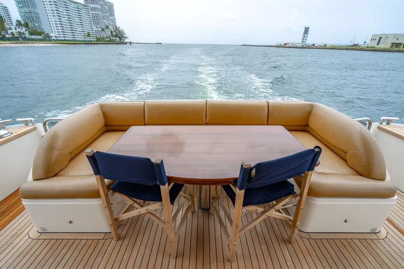  Yacht Photos Pics Luxurious seating area on 2012 Princess Flybridge 72 Motor Yacht, overlooking ocean view.