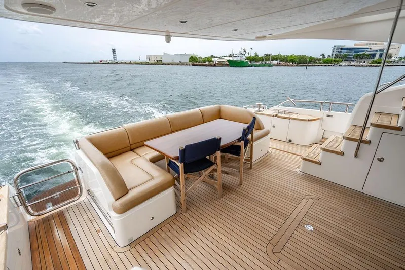  Yacht Photos Pics Luxurious 2012 Princess Flybridge 72 Motor Yacht with spacious deck and seating area.