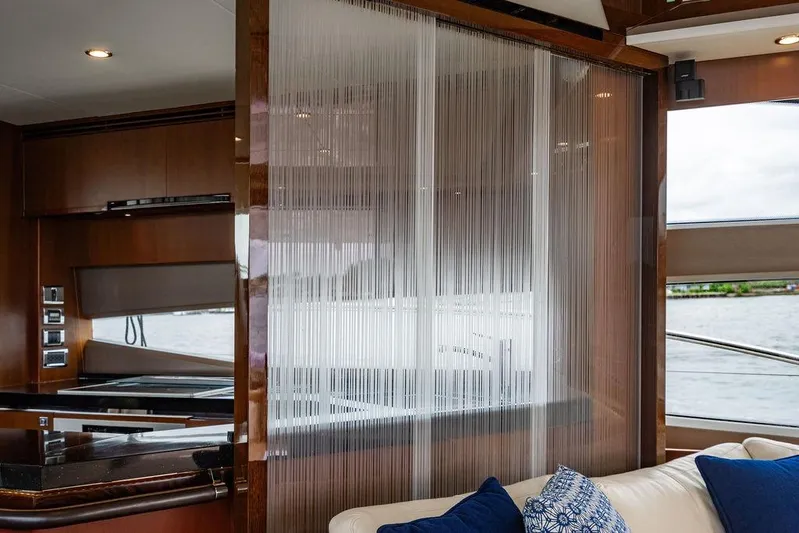  Yacht Photos Pics Luxurious interior of 2012 Princess Flybridge 72 Motor Yacht with elegant decor and water view.