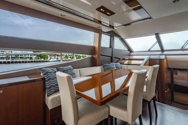  Yacht Photos Pics Luxurious interior of 2012 Princess Flybridge 72 Motor Yacht with elegant dining area.