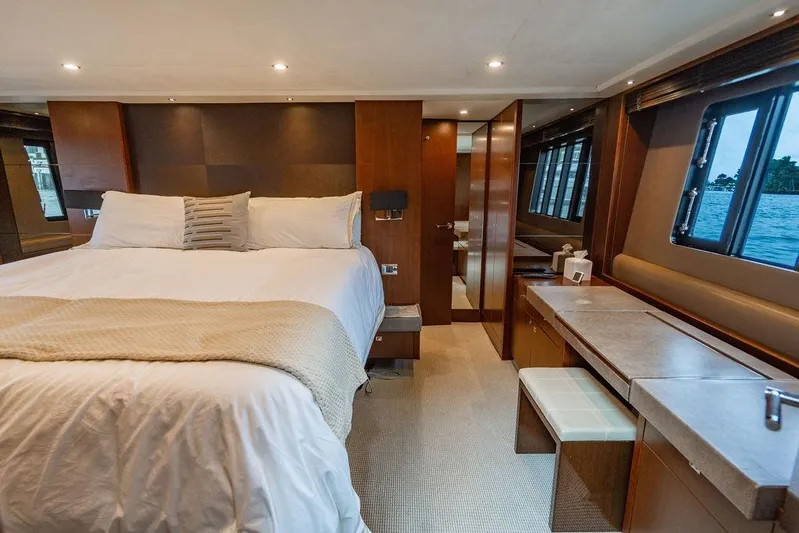  Yacht Photos Pics Luxurious bedroom interior of 2012 Princess Flybridge 72 Motor Yacht with elegant furnishings.