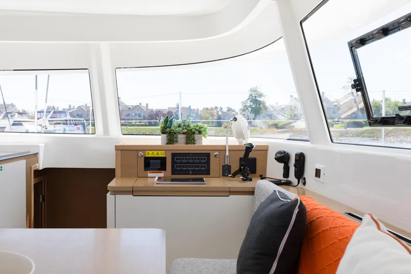 In Stock Yacht Photos Pics Interior of 2024 Excess 14 yacht with modern design and large windows.