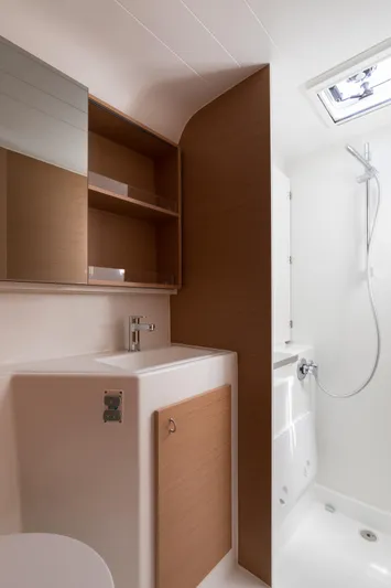 In Stock Yacht Photos Pics 2024 Excess 14 yacht bathroom with modern fixtures and sleek design.