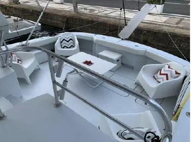  Yacht Photos Pics Luxurious 2004 Hatteras 70 Enclosed Bridge yacht with stylish seating and modern design.