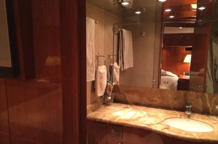  Yacht Photos Pics Luxurious bathroom interior on 2004 Hatteras 70 Enclosed Bridge yacht.