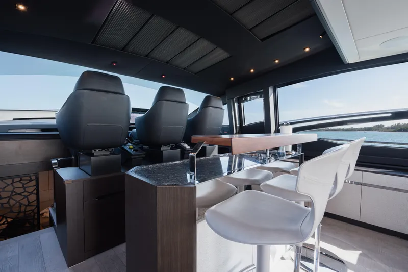 Alexandra Yacht Photos Pics Interior of 2020 Pershing 8X yacht with modern seating and sleek design.