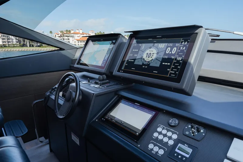 Alexandra Yacht Photos Pics Cockpit of 2020 Pershing 8X yacht with advanced navigation displays and controls.