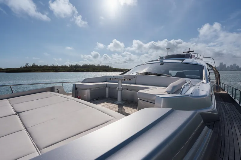 Alexandra Yacht Photos Pics Luxury Pershing 8X yacht, 2020 model, cruising on a sunny day with scenic water views.
