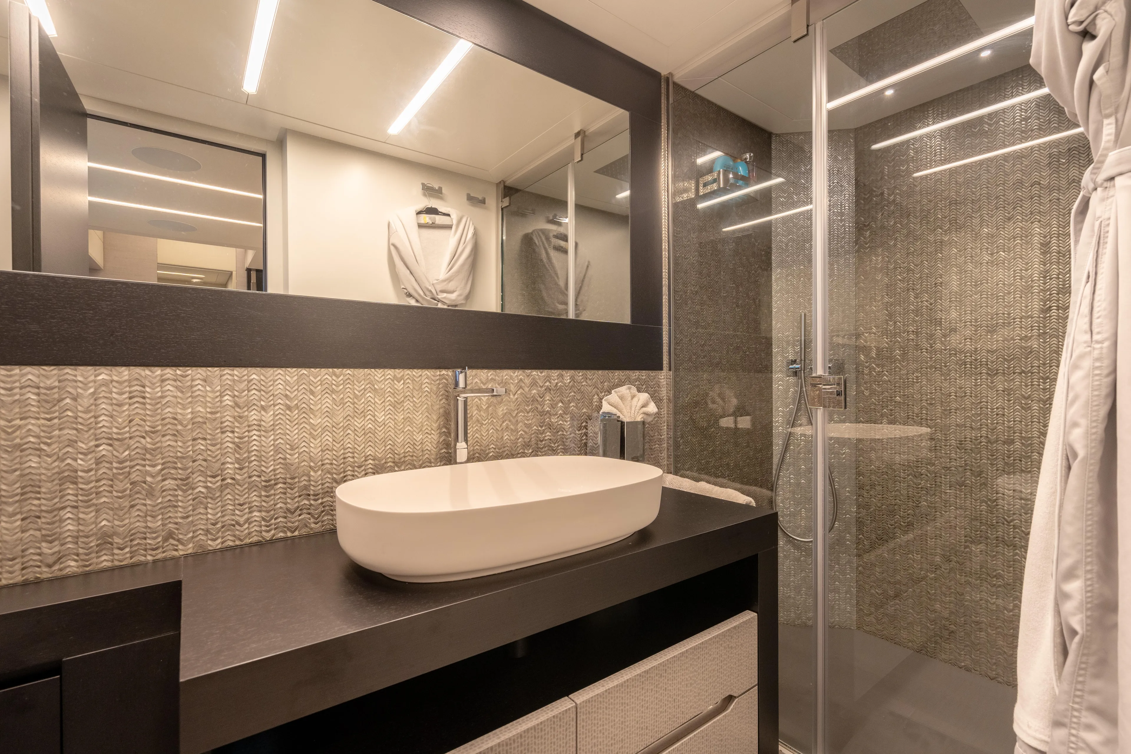 Alexandra Yacht Photos Pics Luxurious bathroom in 2020 Pershing 8X yacht with modern sink and glass shower.