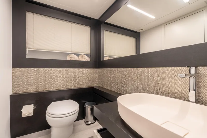 Alexandra Yacht Photos Pics Modern bathroom interior on 2020 Pershing 8X yacht, featuring sleek design and elegant fixtures.