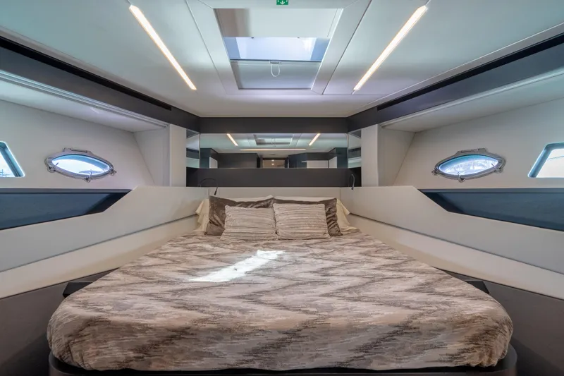 Alexandra Yacht Photos Pics Luxurious bedroom interior of 2020 Pershing 8X yacht with modern design and skylight.