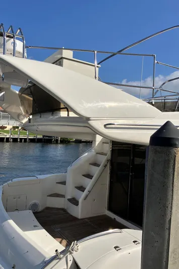 Sea Jeanie Yacht Photos Pics 1999 Viking Princess 52 Express Bridge yacht with sleek design and spacious deck.